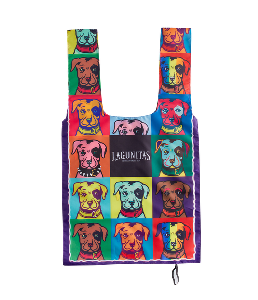 A Lagunitas tote bag with playful dog-themed designs. The tote showcases various adorable pups, celebrating the bond between beer enthusiasts and their furry friends. Ideal for dog lovers and Lagunitas fans, these durable bags are perfect companions for trips to the dog park or the TapRoom. Carry all your essentials and more with this one-of-a-kind tote that exude style and showcase your passion for your favorite brewery."