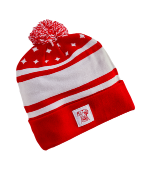 “A festive winter hat featuring a holiday-themed design and a pom-pom. Made with premium quality knit, it offers warmth and coziness. Embroidered with the Lagunitas logo, this stylish accessory is perfect for cold weather and makes a great gift for beer enthusiasts”